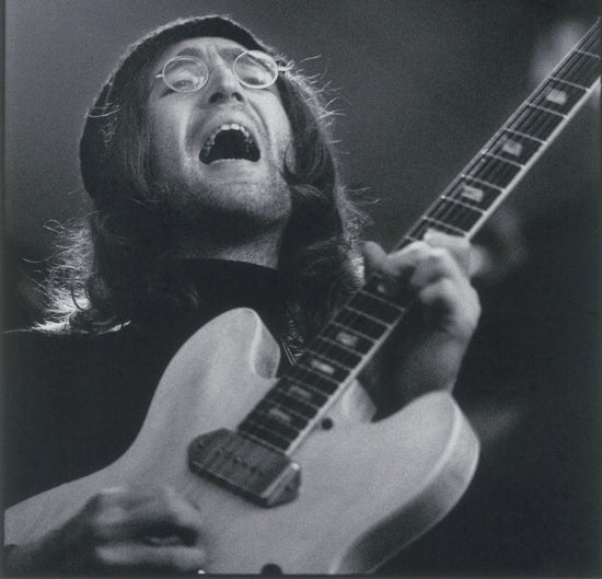 John Lennon Sings